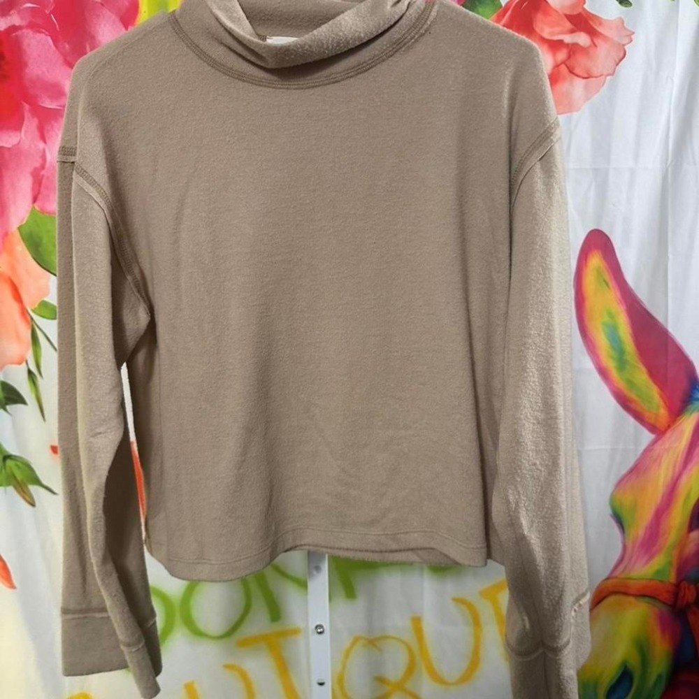 S169. Lush brown long sleeve top with button detail